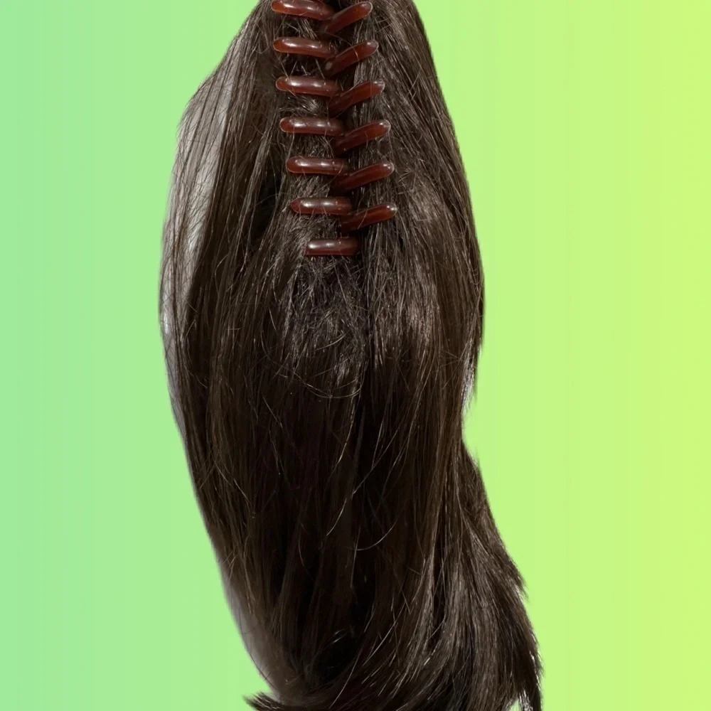 12 inch clip in dark brown ponytail. Never used.